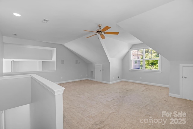 additional living space featuring a ceiling fan, lofted ceiling, baseboards, carpet, and recessed lighting
