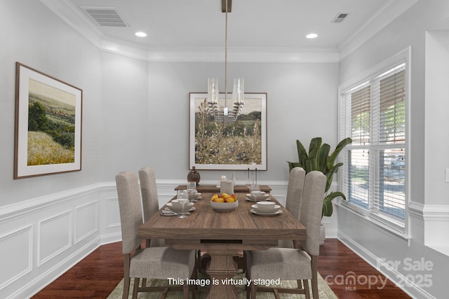 3009 Scottcrest Way, Waxhaw, NC 28173 - dining room featuring wood finished floors, a wainscoted wall, a chandelier, crown molding, and recessed lighting