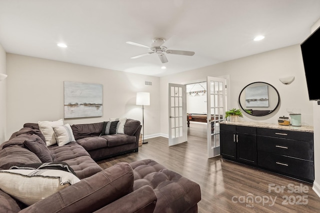 living room with dark wood-style floors, recessed lighting, french doors, and visible vents