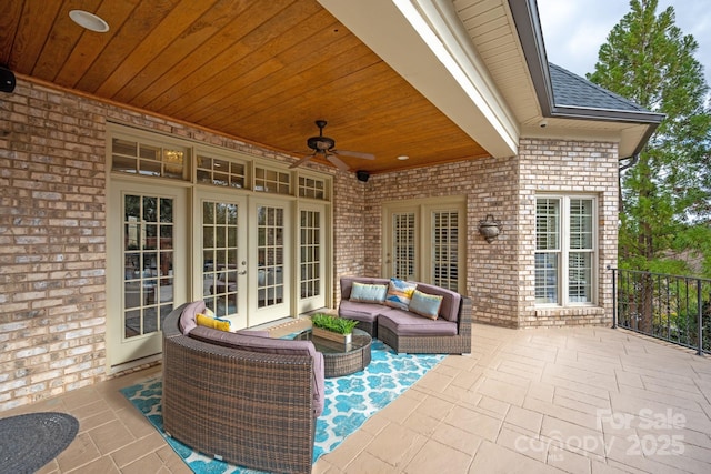 view of patio / terrace featuring a ceiling fan, french doors, and an outdoor hangout area