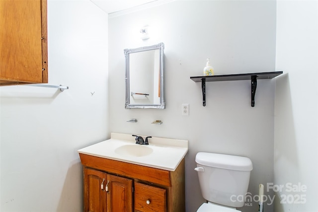 half bath with vanity and toilet