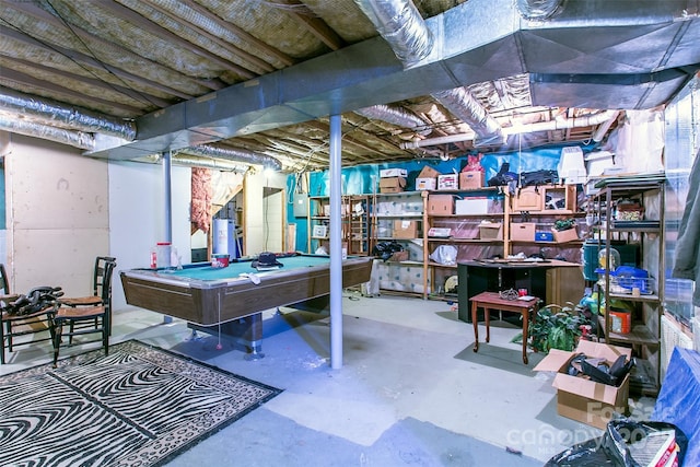 interior space with billiards, water heater, and concrete flooring