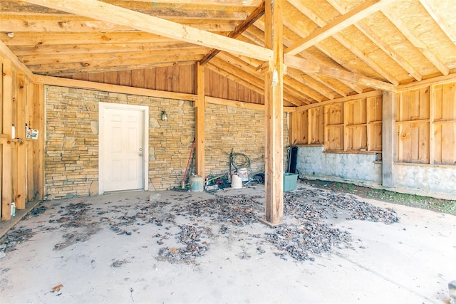 misc room with lofted ceiling