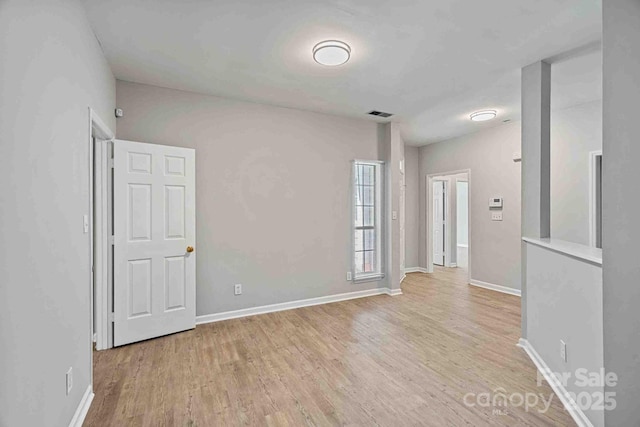 empty room featuring light wood-type flooring