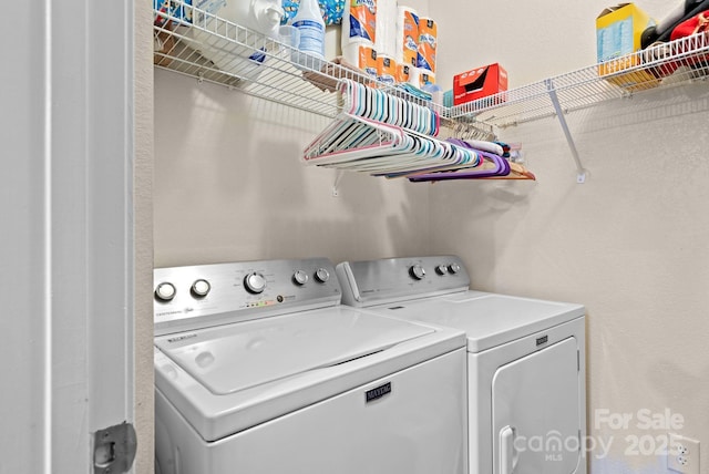 laundry area with washer and dryer