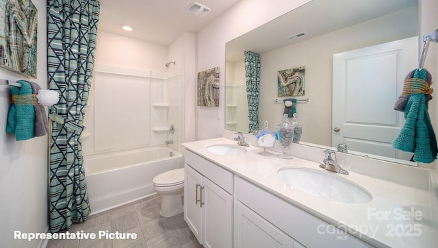 full bathroom with vanity, shower / bathtub combination with curtain, and toilet