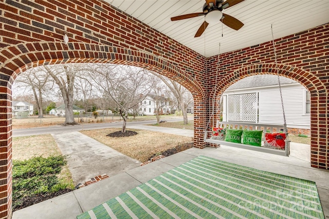 view of patio with ceiling fan