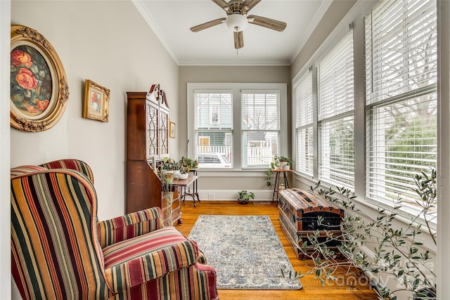 sunroom / solarium with ceiling fan