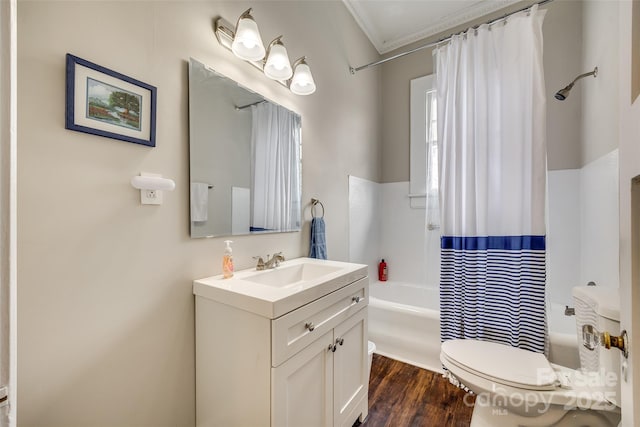 full bathroom with shower / tub combo with curtain, toilet, vanity, ornamental molding, and hardwood / wood-style flooring