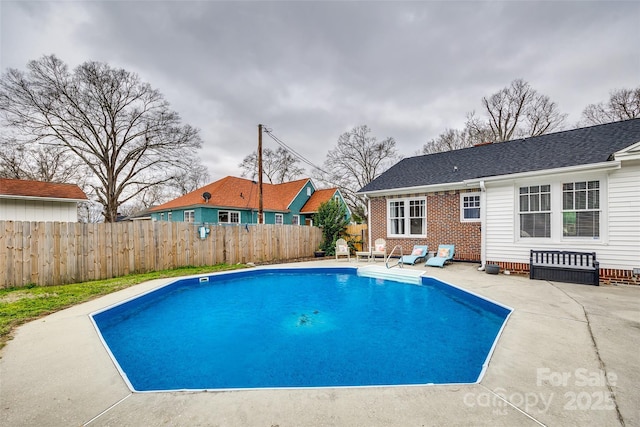 view of pool with a patio area