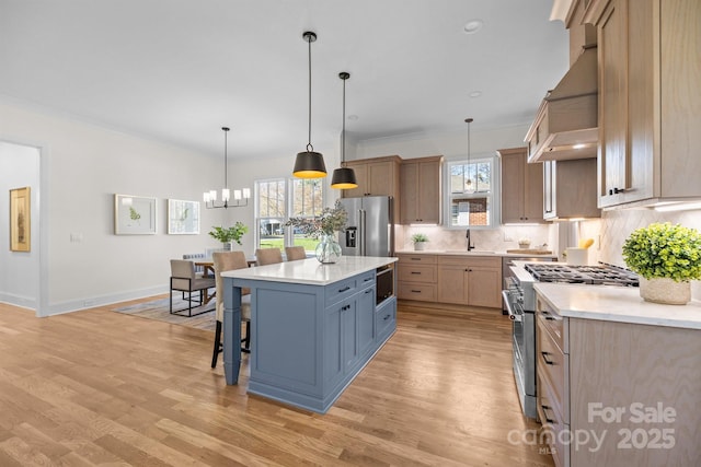 kitchen featuring a kitchen bar, custom range hood, a sink, light countertops, and high end appliances