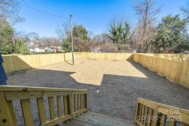 view of yard with a fenced backyard