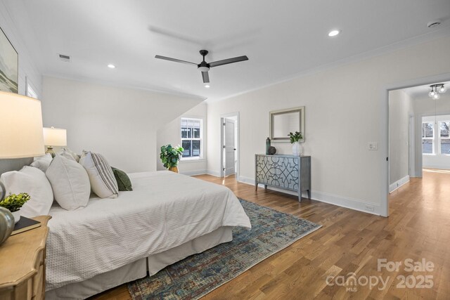 1824 Haines St, Charlotte, NC 28216 - bedroom with visible vents, recessed lighting, baseboards, and wood finished floors