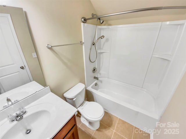 full bathroom with vanity, tub / shower combination, tile patterned floors, and toilet