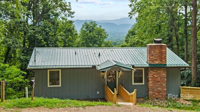 view of front of house with a mountain view