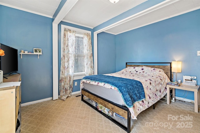 bedroom featuring light carpet, baseboards, and crown molding