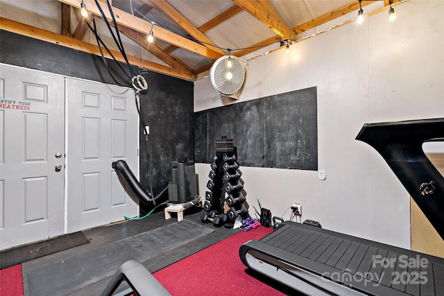 exercise area with vaulted ceiling