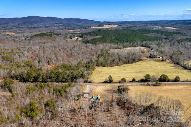 bird's eye view with a mountain view and a rural view