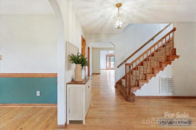 entrance foyer featuring light hardwood / wood-style floors