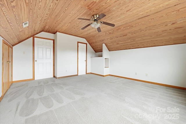 bonus room featuring lofted ceiling, light carpet, wooden ceiling, and ceiling fan