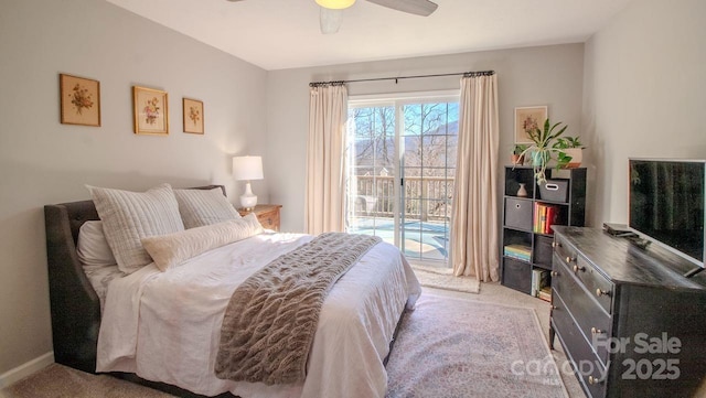 carpeted bedroom with ceiling fan, access to outside, and baseboards