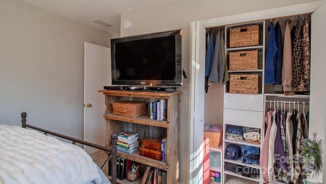 bedroom with visible vents