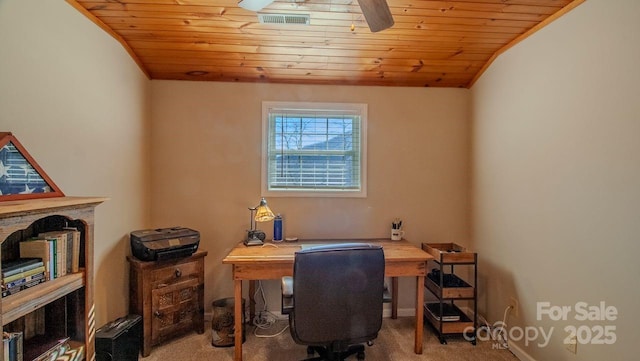 carpeted office with wood ceiling, visible vents, crown molding, and ceiling fan