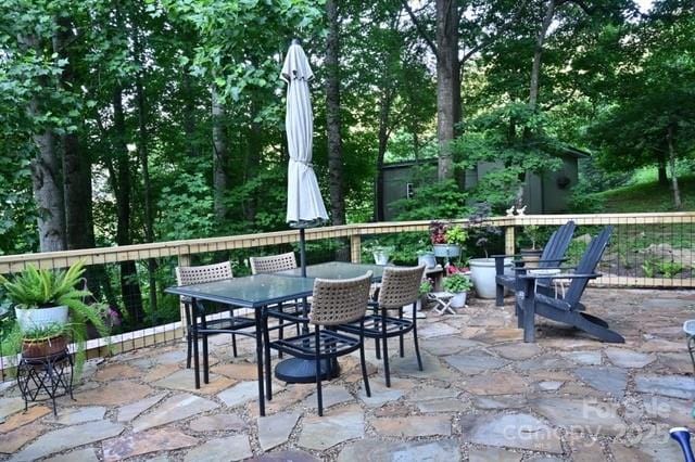 view of patio with outdoor dining area