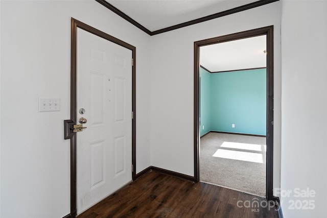 entryway featuring crown molding and dark wood-type flooring