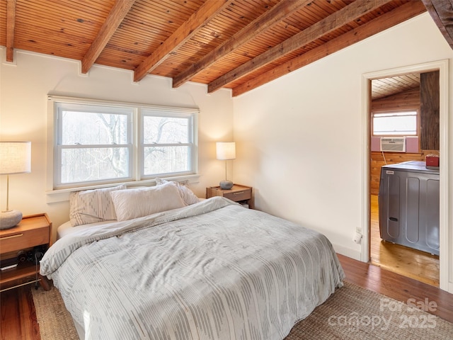 bedroom with cooling unit, hardwood / wood-style floors, lofted ceiling with beams, and wooden ceiling