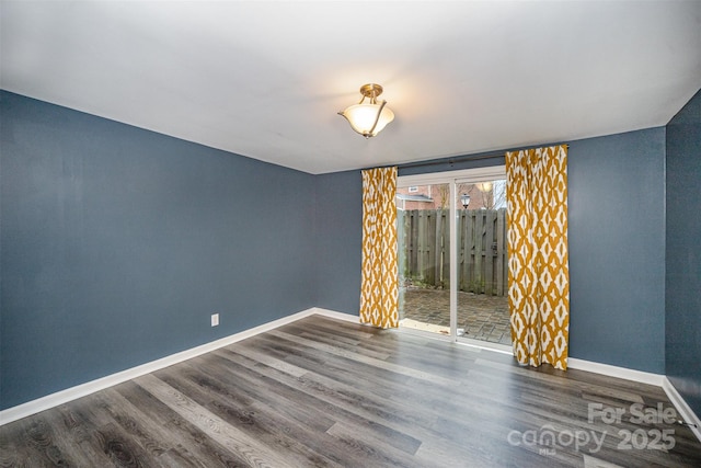 empty room featuring dark hardwood / wood-style floors