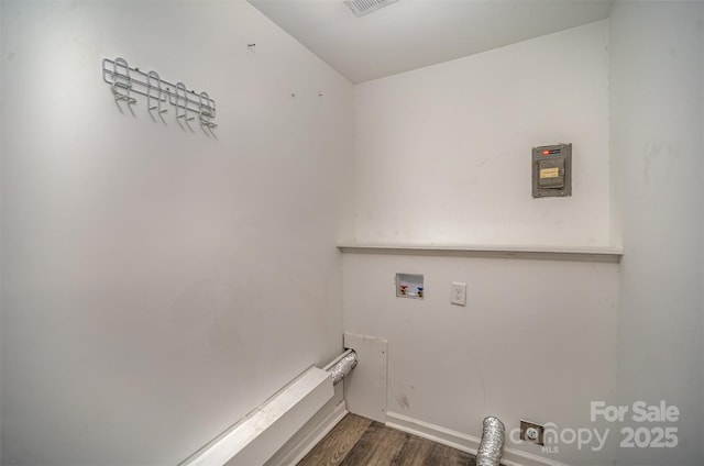 laundry area with dark hardwood / wood-style flooring, hookup for a washing machine, and hookup for an electric dryer