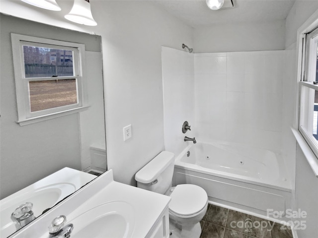 full bathroom with shower / tub combination, vanity, toilet, and tile patterned flooring