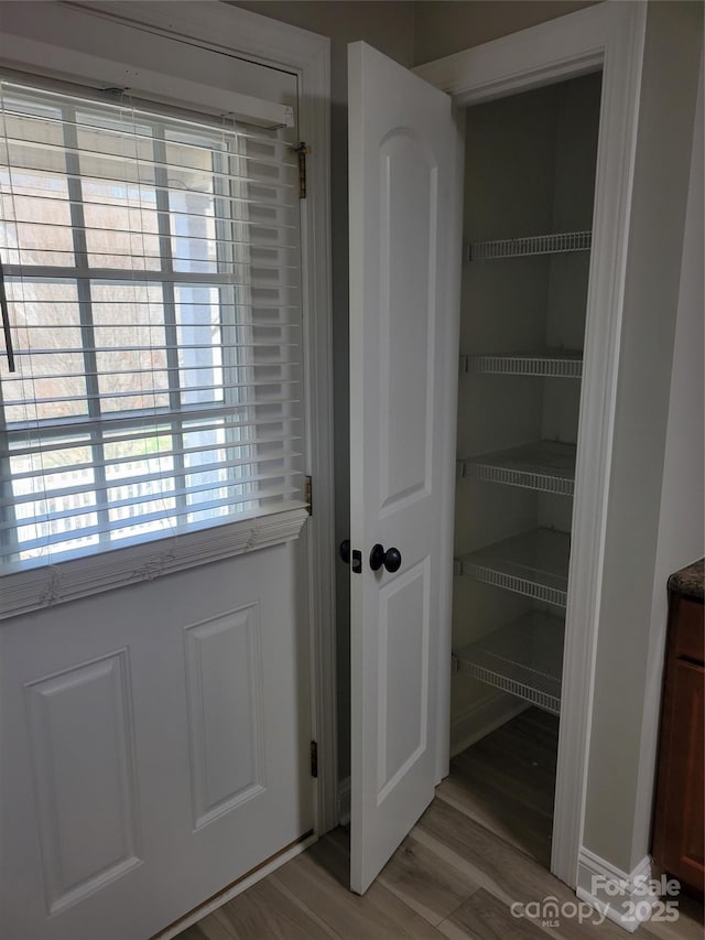 interior space with light hardwood / wood-style floors