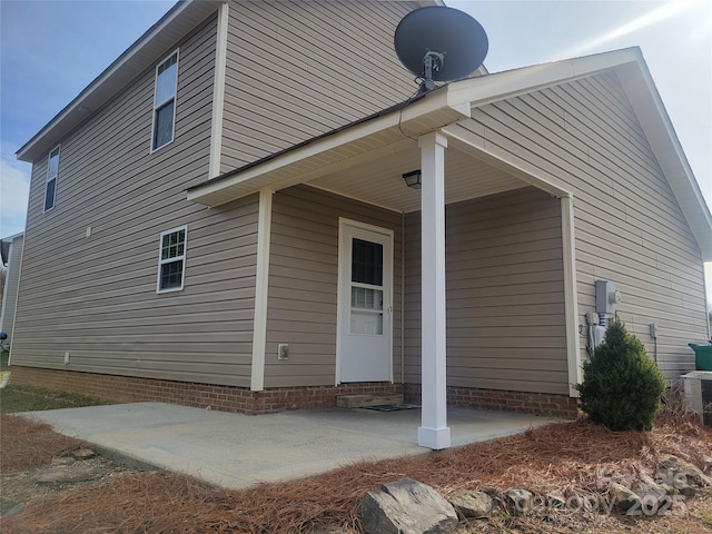 view of home's exterior featuring a patio area