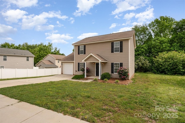 view of front facade with fence, an attached garage, driveway, and a front lawn