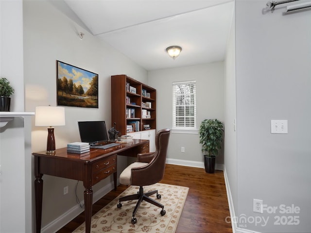 office area featuring dark wood-type flooring and baseboards