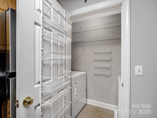 spacious closet featuring tile patterned floors