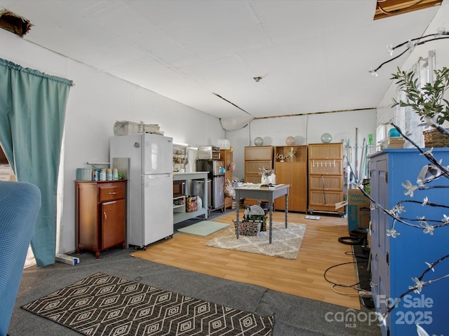 interior space with hardwood / wood-style floors