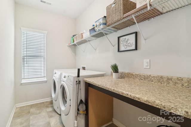 laundry area featuring separate washer and dryer