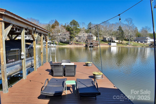 dock area with a water view