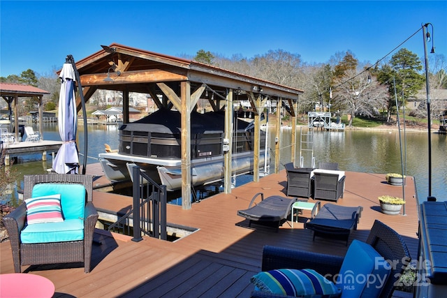 dock area featuring a water view and boat lift