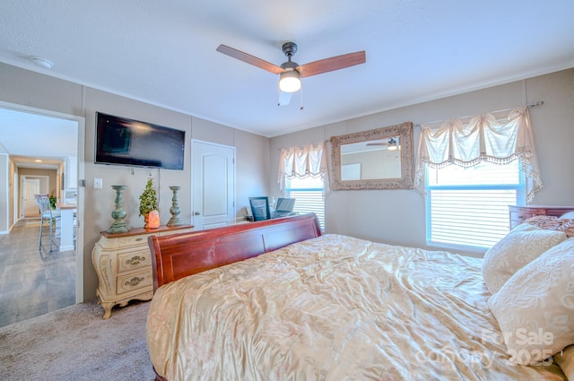 bedroom with carpet floors and ceiling fan