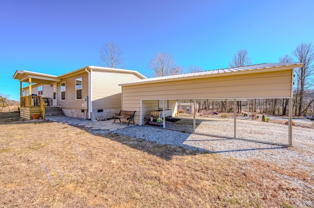 view of side of property featuring a carport