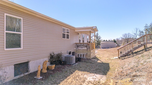 view of yard with central AC