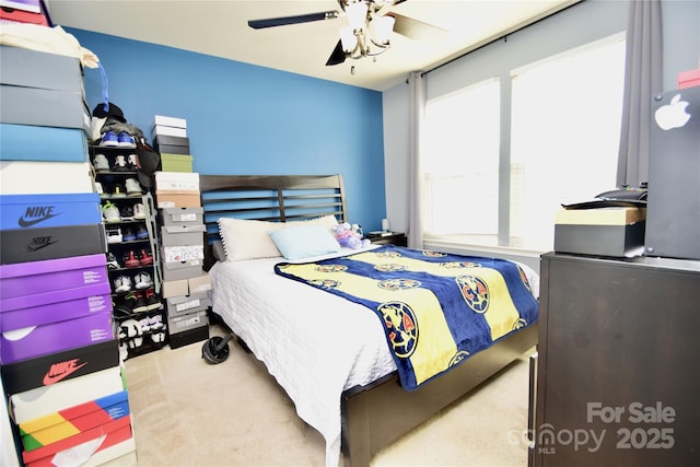 bedroom featuring ceiling fan