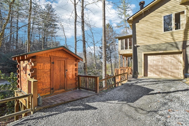 view of home's exterior with driveway and an attached garage