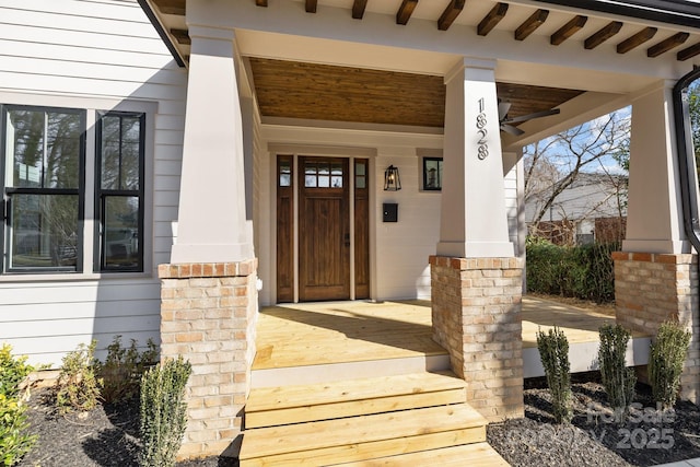 property entrance featuring covered porch