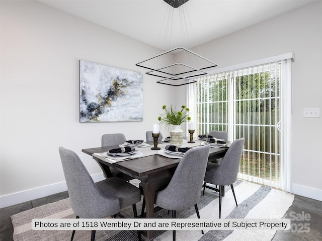 dining room with a notable chandelier