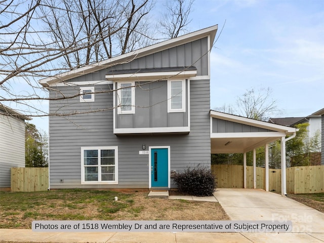 view of front of property with a carport